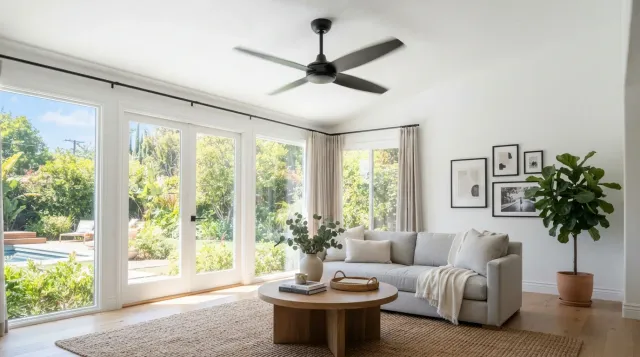 A modern ceiling fan mounted on a living-room ceiling in a Southern California home